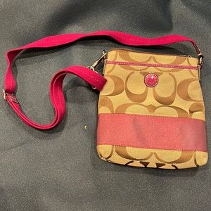 Coach crossbody. Brown and magenta. Adjustable straps. Perfect condition.